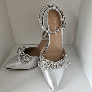 NIB BCBGeneration silver stiletto heels size 6.5